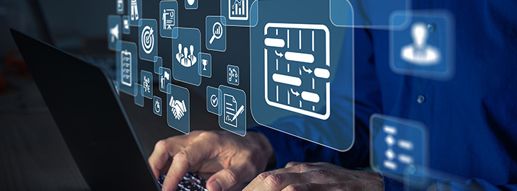 Project manager working on computer at the office. Concept with icons of management areas such as cost, planning, risks, schedule