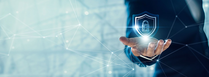 businessman holding cyber shield with padlock
