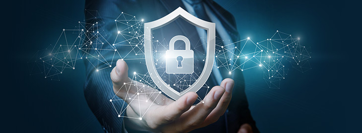 cybersecurity engineer holding digital shield with padlock