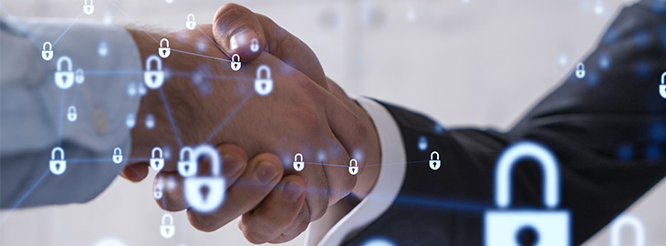 businessmen shaking hands with floating digital padlocks