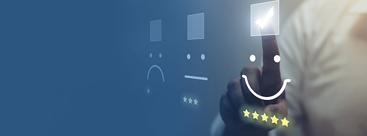 Businessman pressing smiley face emoticon on virtual touch screen. Customer service evaluation concept