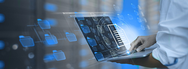 businessman using a data management platform on laptop