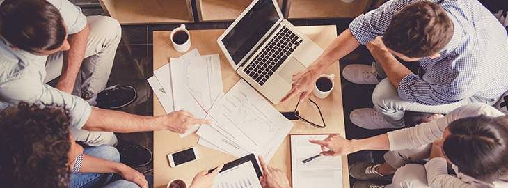 people working together at a desk