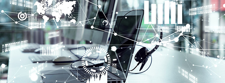 laptop on desk surrounded by information system nodes