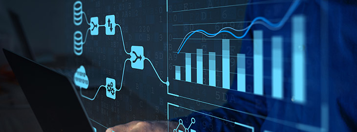 Analyst working with business analytics and data management system on computer