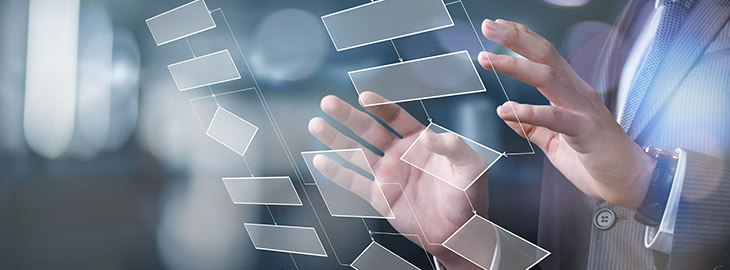 man working with flow diagram on touchscreen