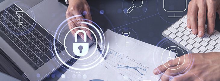 Two businesspeople man and woman working on the project to protect cyber security of international company. Padlock Hologram icons over the table with documents.