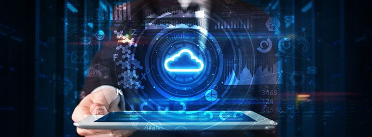 Hand holding tablet with cloud technology and dark concept