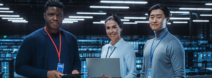 cybersecurity engineers standing in a data center